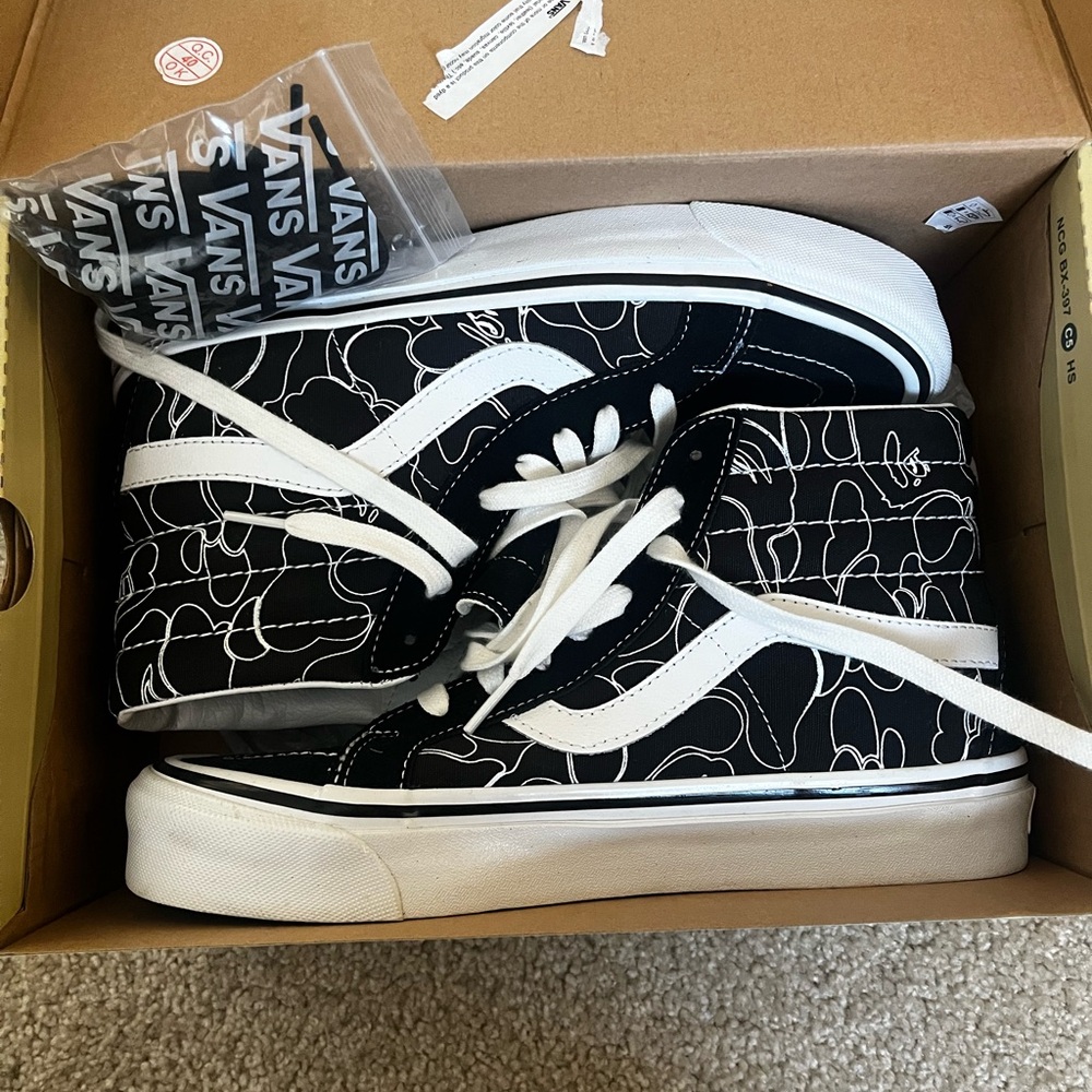 Vans Black and White High-Top Sneakers
